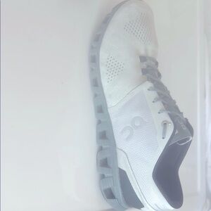 On Running White and Gray Athletic Shoes with Ventilated Design